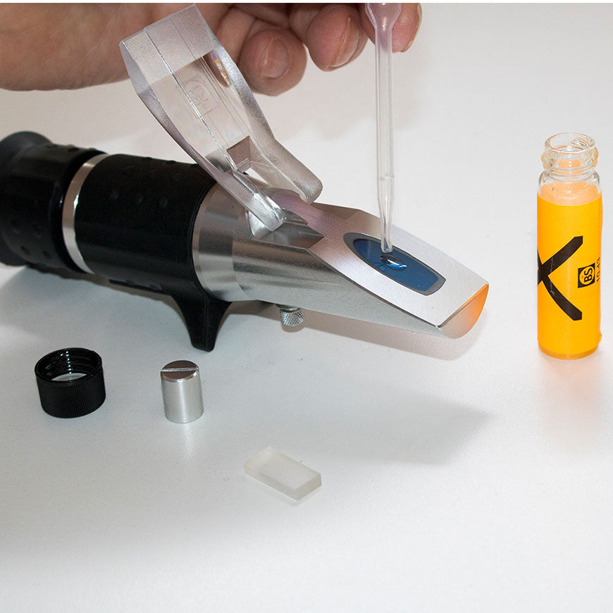 Eclipse refractometer calibration test plate and fluid